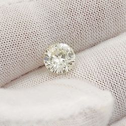 1.40 Carat I2, Color M, Round Brilliant Cut Natural Diamond.