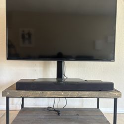 50” Vizio TV and Insignia sound bar  **TV stand  and table is NOT included**