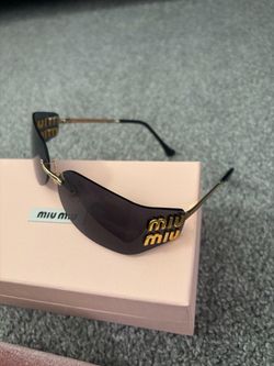 Black Rimless Miu Miu Women’s Sunglasses