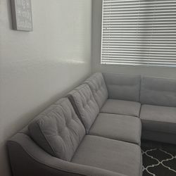 Grey Couch , Yellow Pillows