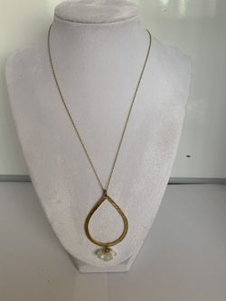 Gold tone necklace with Quartz Crystal pendant