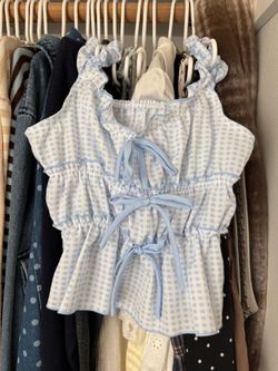 White and blue checkered ruffle top