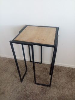 Brown and black plant table
