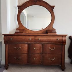 Beautiful wooden dresser with a mirror, mirror seperable , clean and high quality,  dresser 64x38x19 inch, mirror 43x51 inch, 8 drawers +2, $150 OBO