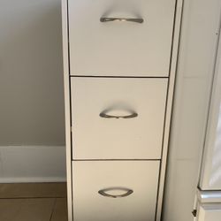 Compact White Storage Cabinet. 12x12x32”