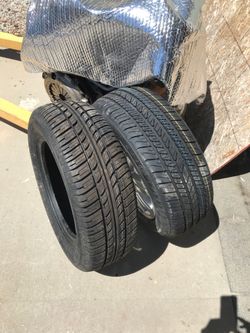 2 tires 205/60R/15 one has a aluminum rim that fit Audi both are brand new?