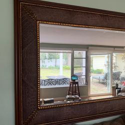 Wall mirror-Deep, textured faux-alligator surround with gold accents. 56x45