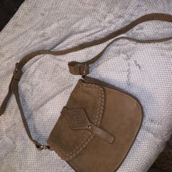 small brown purse with adjustable strap