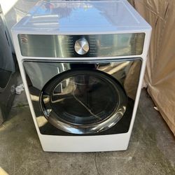 Kenmore dryer semi-new front load electric 220 volts capacity 7•5 with 3 months warranty free delivery in the Oakland area outside the Oakland area th