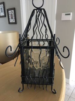 Hanging black metal and glass candle holder 10.5" tall 7" wide Paid $25, selling for $10