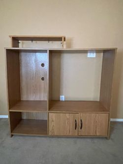 Wood Laminate Entertainment Center with Cabinet. OBO