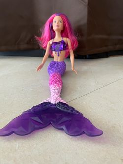 Mermaid, Barbie dolls with dolphin