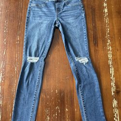 Vanilla Star Girls Skater Jeans, Size 10 – trendy blue denim with a comfortable skater fit. These jeans feature stylish distressed details, perfect fo