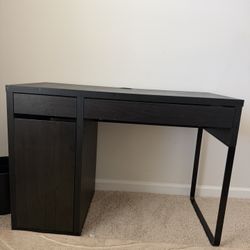 One Twin Bed, Two Desks, Two Bookshelves. 