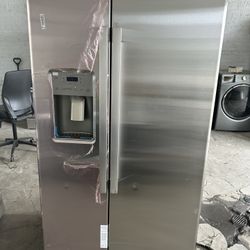 GE counter depth side by side refrigerator 69” H x 36” W x 27” D. 