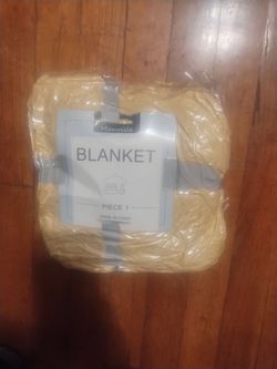 Yellow throw blanket