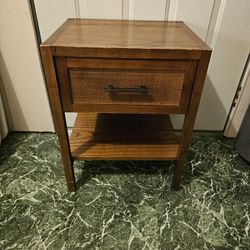 Real wood end table with pull out drawer. 18" X 15" and 23" tall