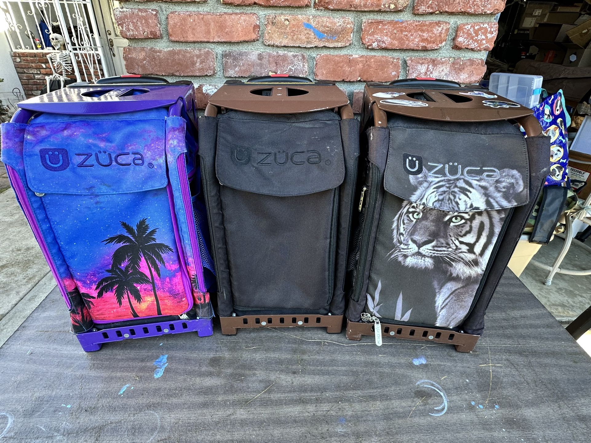 Two Zuca Rolling Backpacks