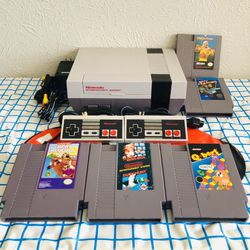 Nintendo NES In Mint Condition With Super  Mario, QBert & More