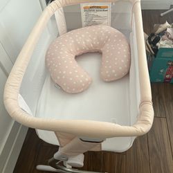Baby’s Crib And Lots Of Clothes 
