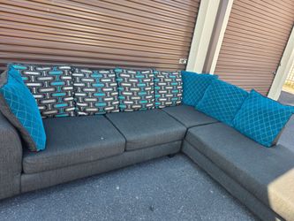 Gray Fabric Sectional Sofa with Pillows
