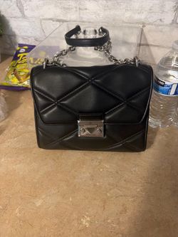 Bolsa mk como nueva