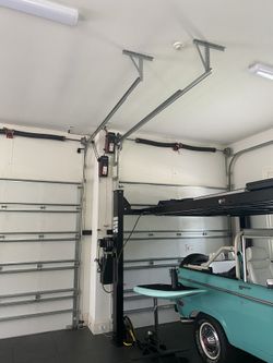 Overhead Garage Door Spring Opener Off Track Adjustment Replace and Parts