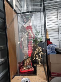 Vintage geisha doll in glass  case