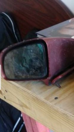 80's model Chevrolet Camaro driver side mirror
