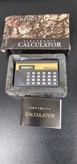 Selling an I·N·F·I·N·I·T·Y electronic calculator. It comes with the original box and the calculator manual. The calculator is in good condition.