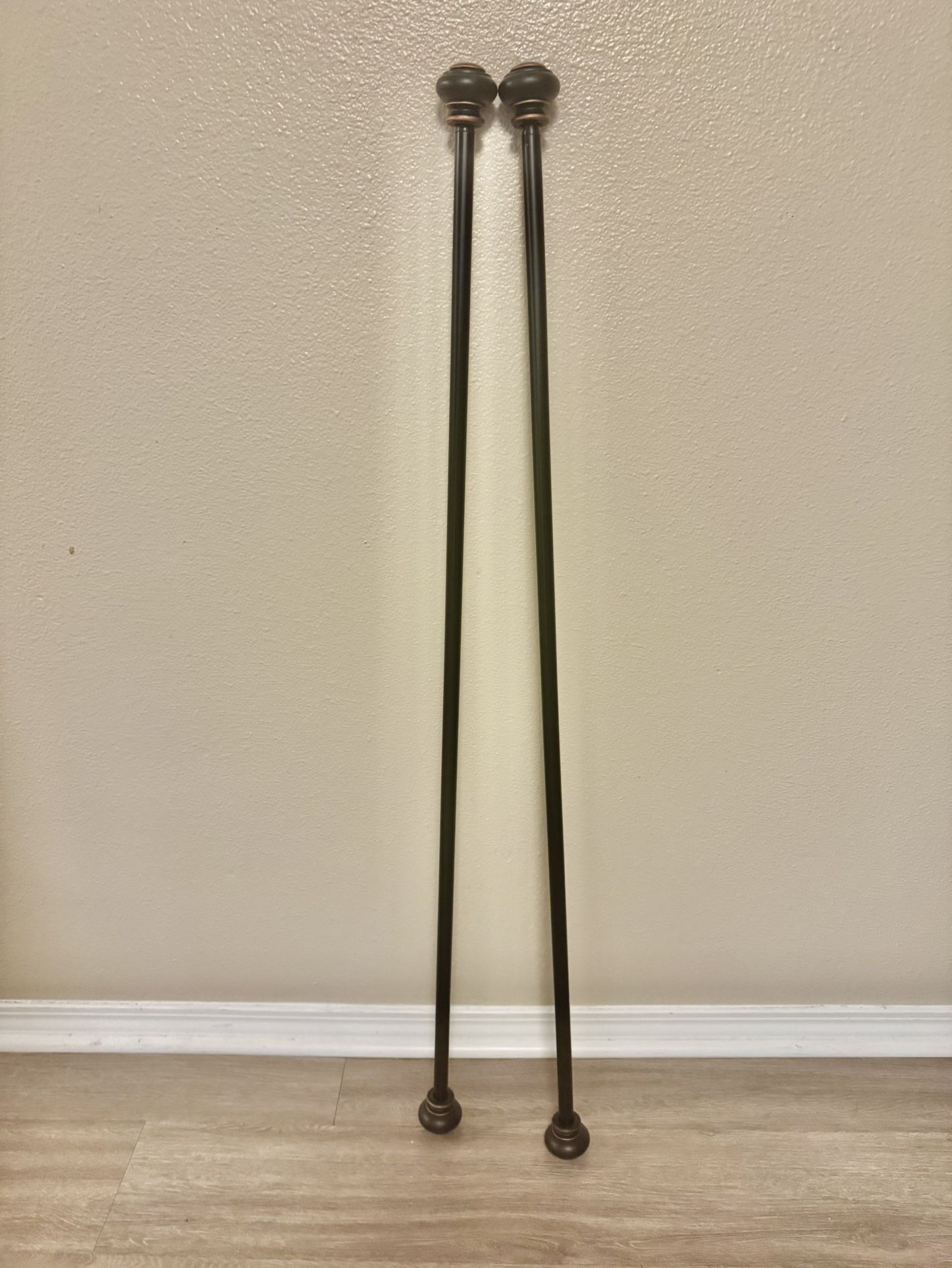 Pair of decorative curtain rods 48” - 91”