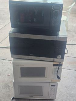 4 used microwaves working condition 55 bucks for the four of them