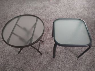 Two small glass tables