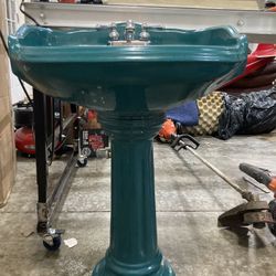 Two Pedestal Sinks And Hot Tub