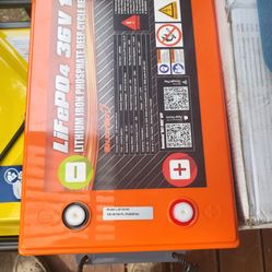 Battery specifications are shown in the photo.