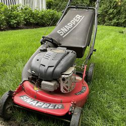 Snapper Lawn Mower and Echo Grass String Trimmer
