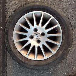 OEM 4 Lug 15x6 Honda Rim And Falken Pro G4 Tire. 