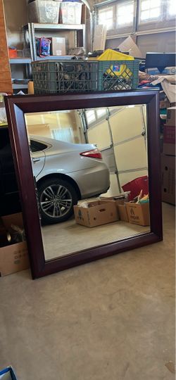 The big mirror with cherrywood. Long 47 inch, 42 inch