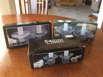 3 Sets of Cristal Candle Holders, never Ben used, $8 each.
