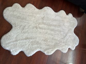 White faux fur rug