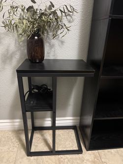 Black side end table with outlet