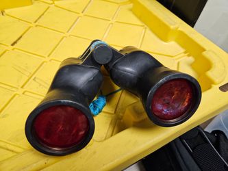 Black Binoculars with Red Lenses