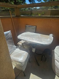 New patio table and two chairs
