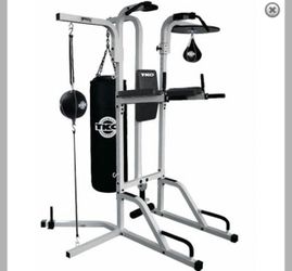 TKO Multi-Station Workout Gym incorporates a 14-gauge steel workout tower on one side and a boxing station on the other