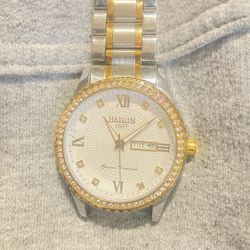 men's Haiqin 1887 quartz dress watch with a two-tone stainless steel bracelet 