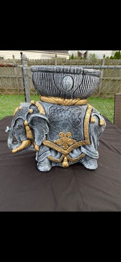 Stone colored elephant, planter statue