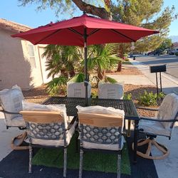 Patio Set All New  Table And 6 Chairs With New Cushions And New Umbrela 