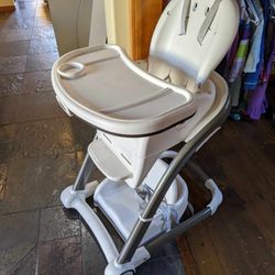 Graco high chair
Booster seat, for when child outgrows highchair