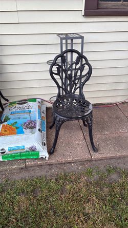 Cast iron chairs and table