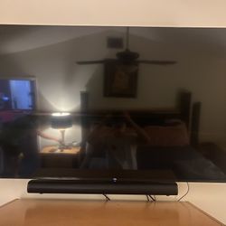 TCL 4K Roku Smart TV + Wall Mount & Soundbar 